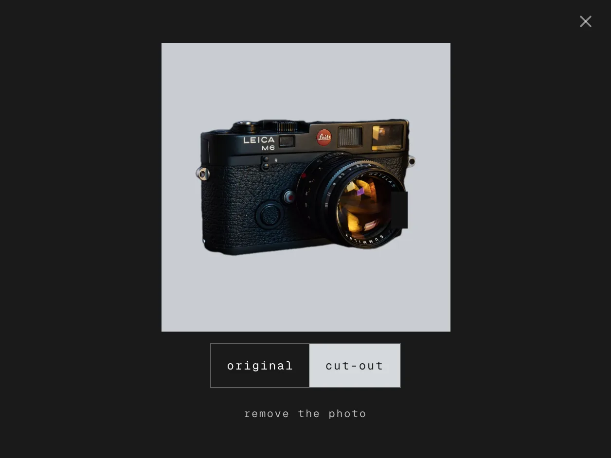an example from a fictional practice. a photo of a leica m6 in the photo viewer after remove background, with the switch between the original and the cut-out.